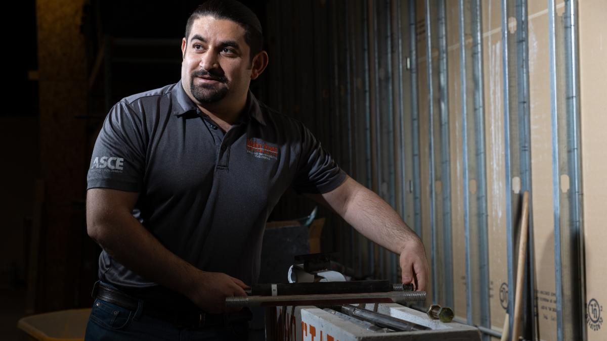 Mustafa Mashal poses for a photo in the Structural Lab on ISU's Pocatello campus.