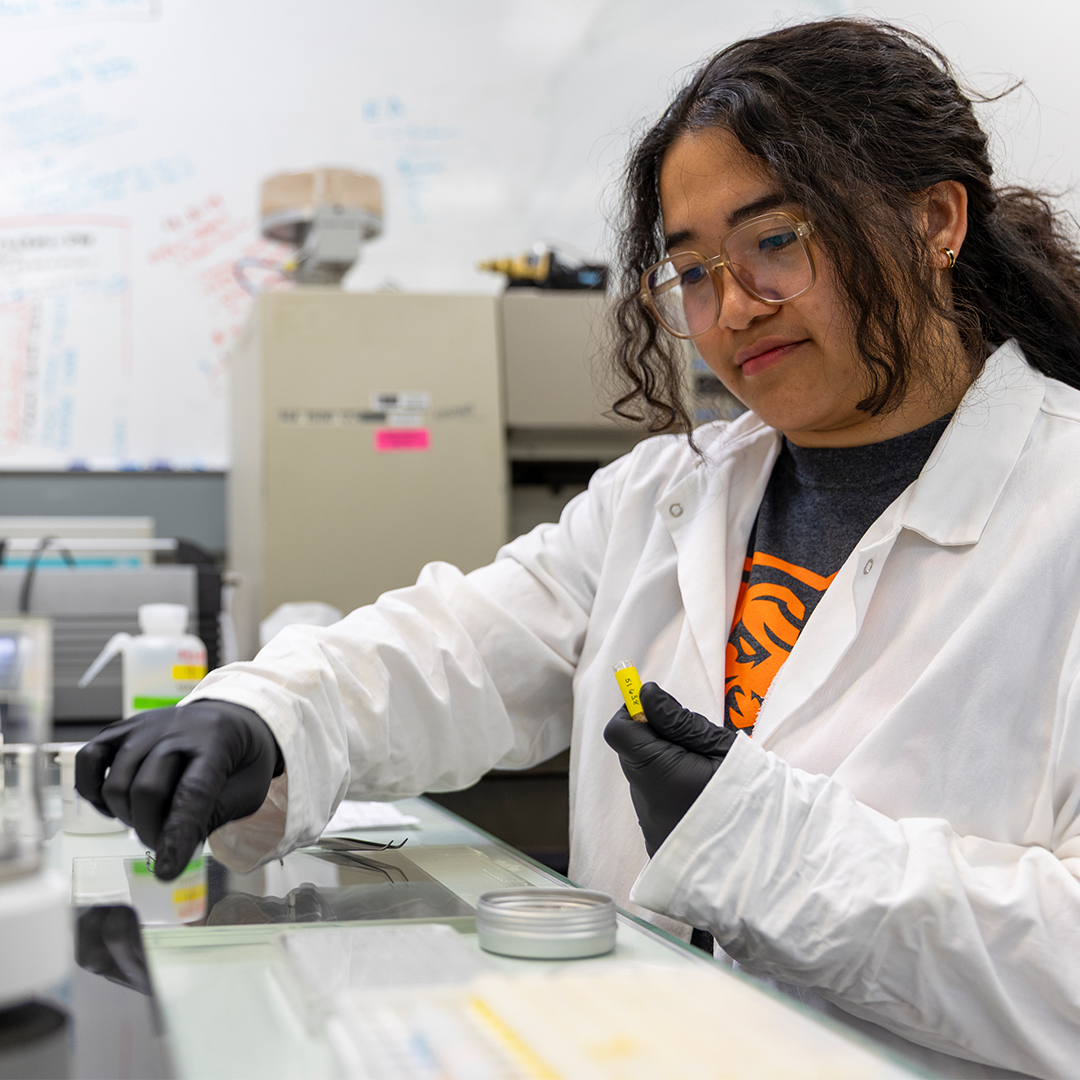 Haskell Distajo graduate student poses for photos in the Stable Isotope Laboratory on Idaho State Universityâs Pocatello campus.