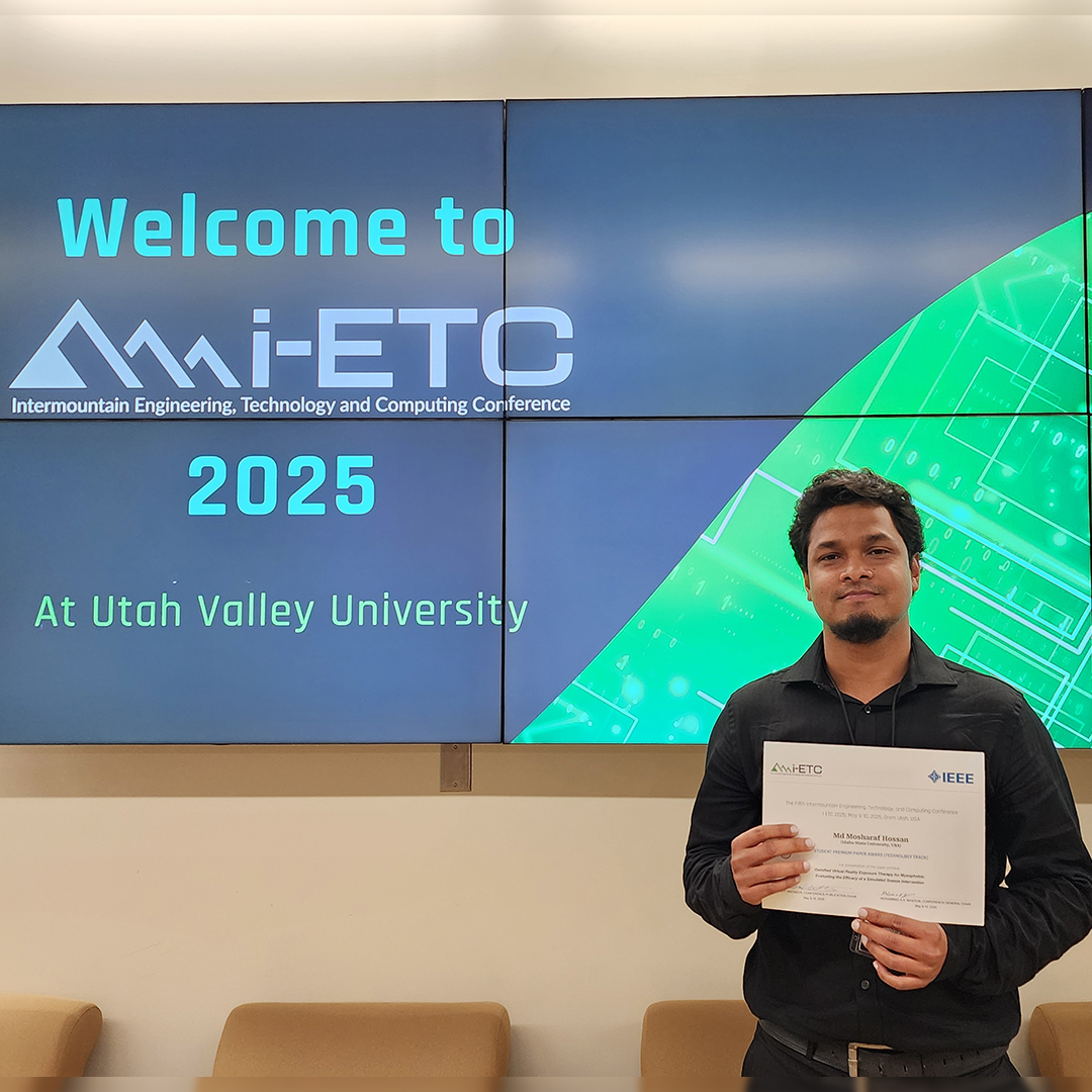 Mosharaf Hossan poses for a photo holding his Premium Paper Award in the Technology Track from the i-ETC conference. 