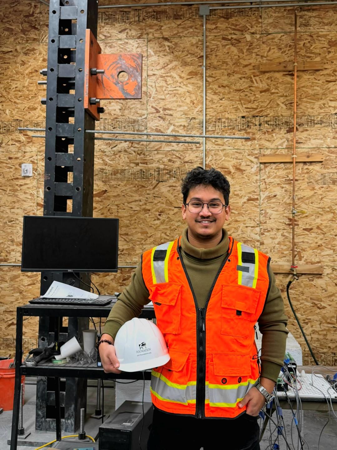 Amit Koirala poses for a photo in ISUâs Structural Lab.
