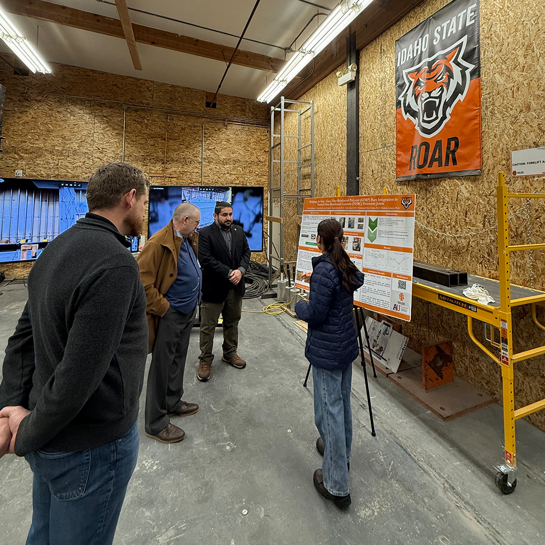 Simon Pimblott tours a lab on the ISU campus