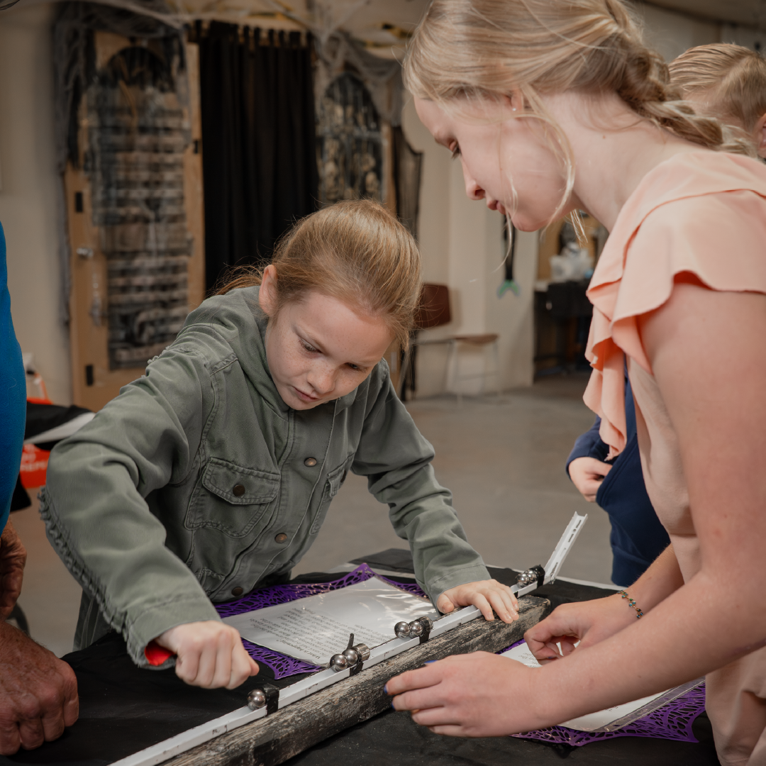 Students participate in an activity at the Haunted Science Laboratory