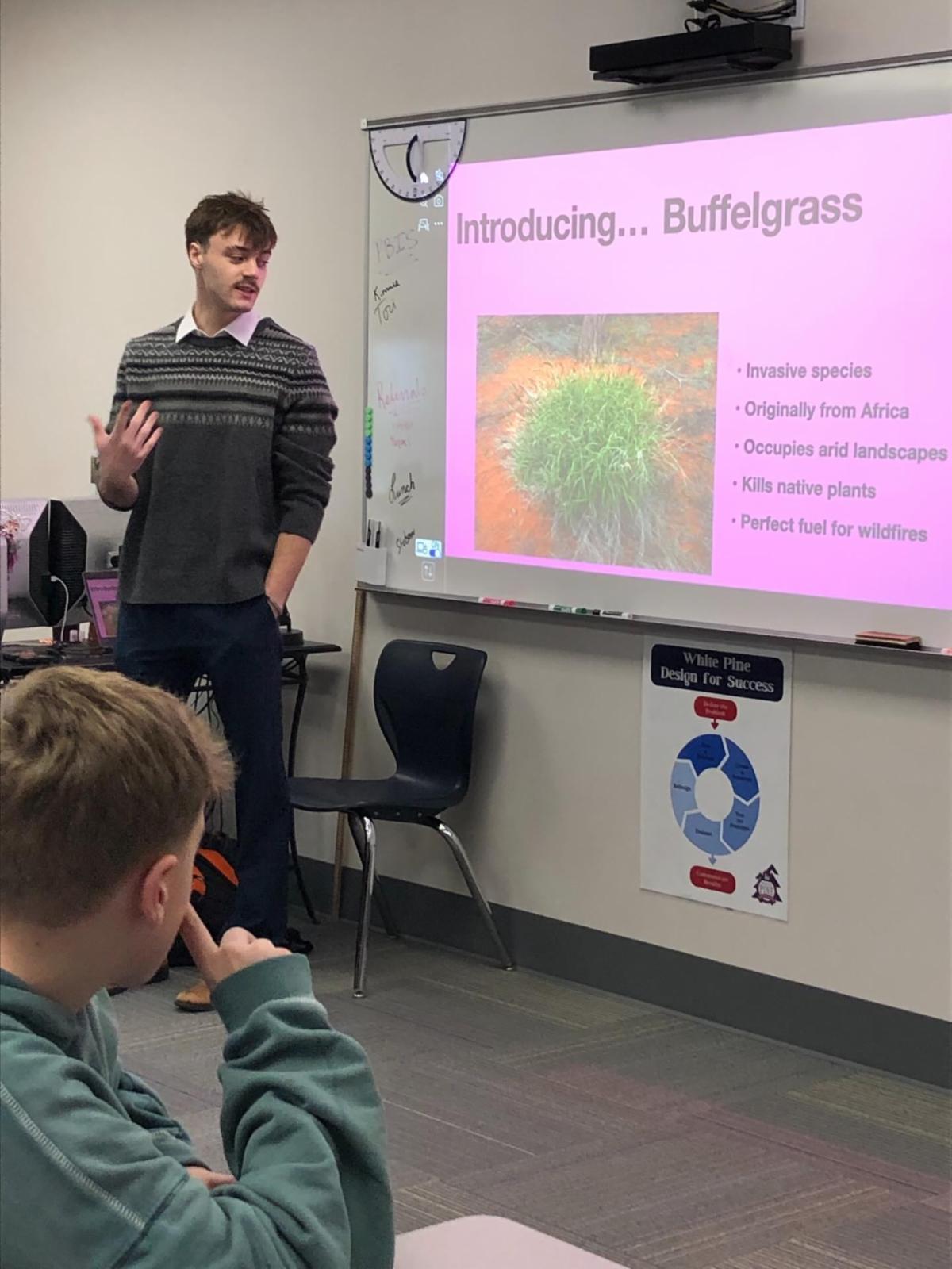 Quinton Smith presents to students at White Pine STEM Academy