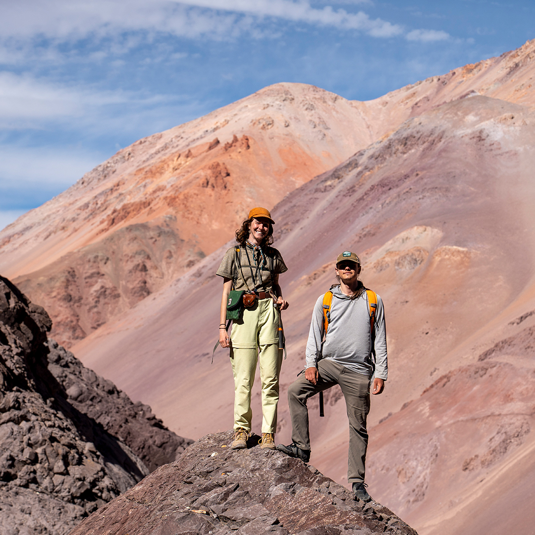 Tiana Hursh and Parker Hazelbush pose after collecting a sample for geochronologic analysis.