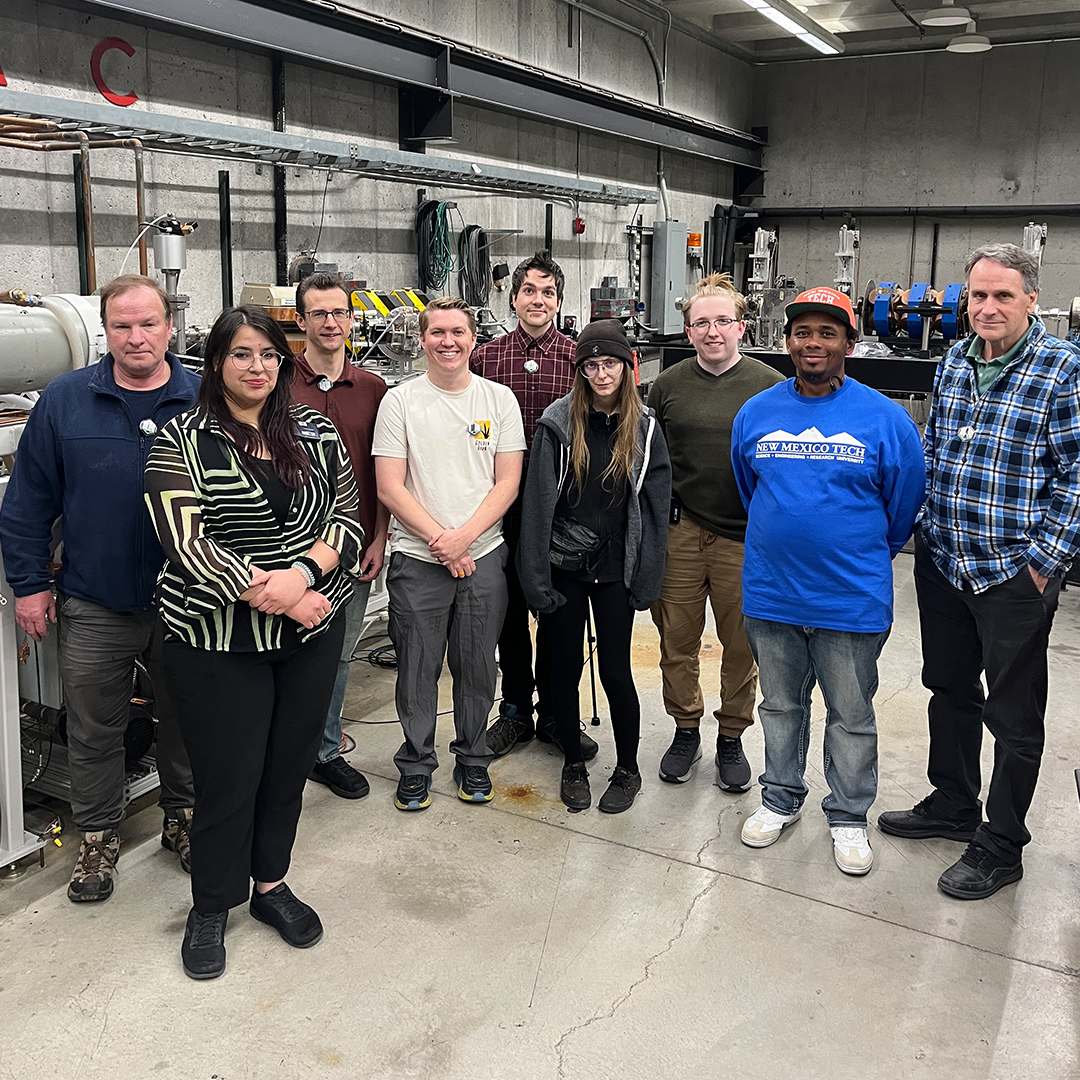 Faculty and students from Idaho State University and New Mexico Tech pose for a photo at the Idaho Accelerator Center