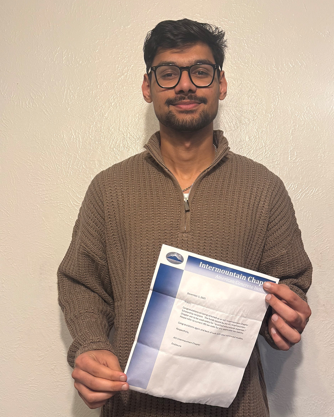 Arpan Adhikari poses for a photo