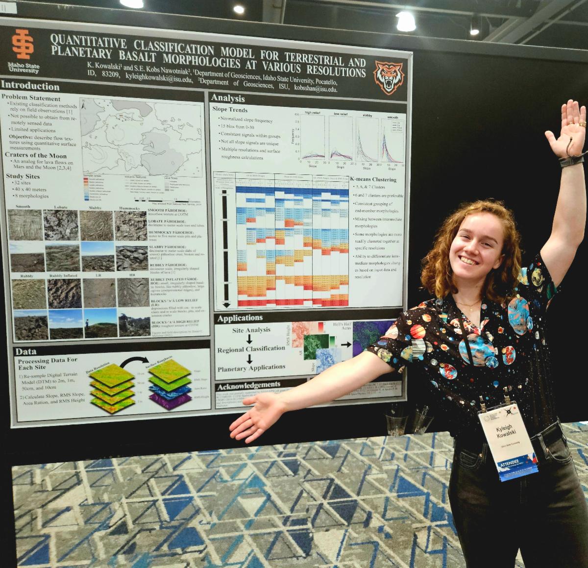 Kyleigh Kowalski poses for a photo with her poster.