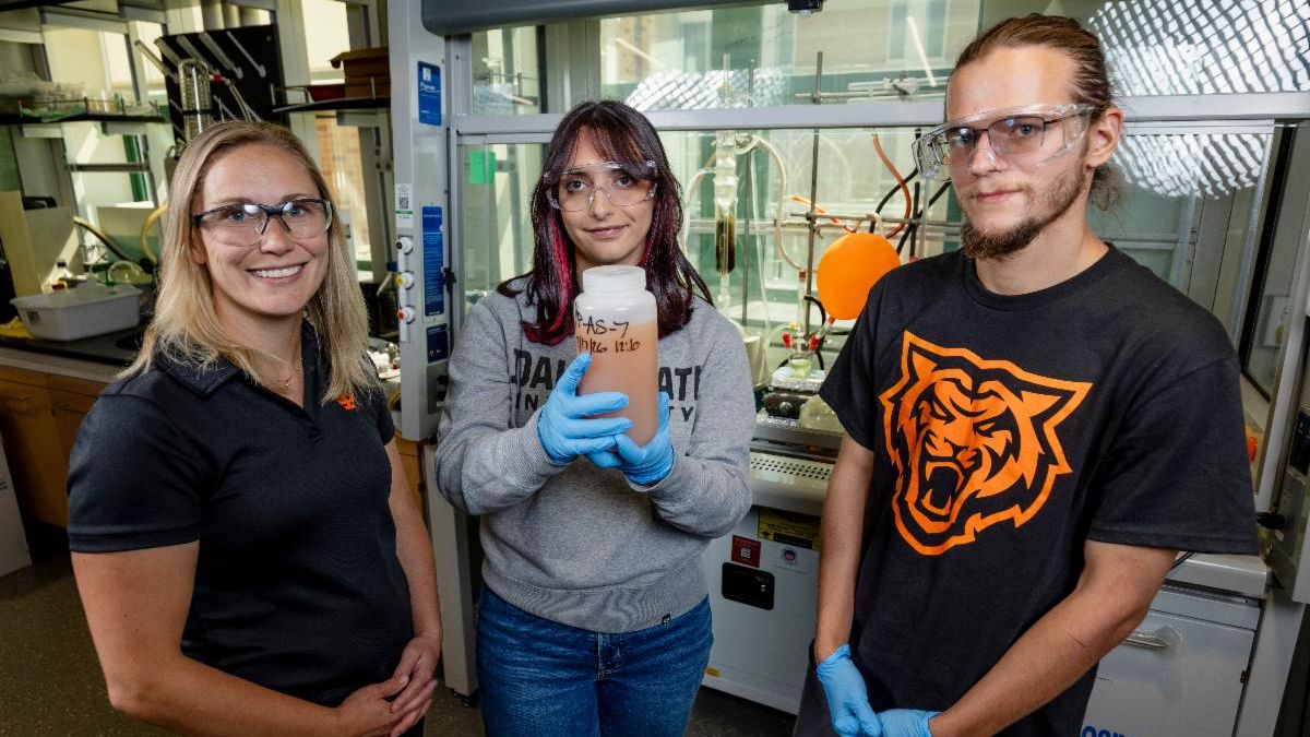 From left, Cori Jenkins, associate professor of chemistry, and students Kira Torrez and Angelo Mayer pose for a photo in a lab in Leonard Hall on ISUs Pocatello campus.
