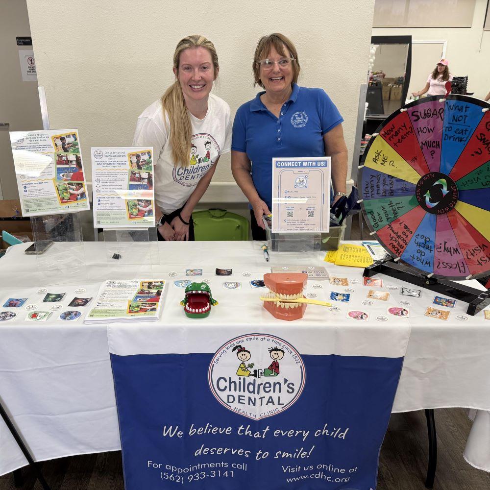Dr. Mackenzie and Jean at the City of Paramount Back to School Giveaway Event