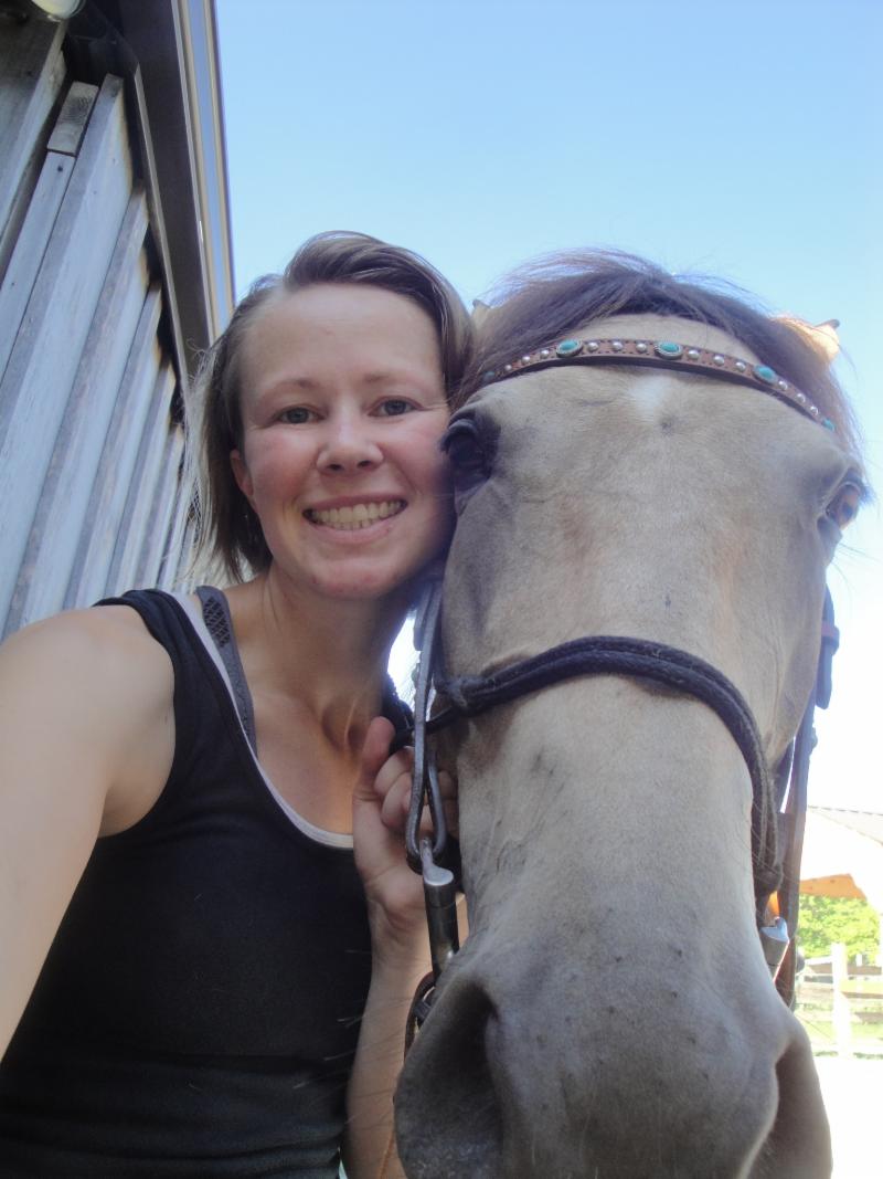 Cynthia Linsenbardt_ blonde woman with white horse