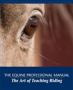 cover of The Equine Professional Manual_ The Art of Teaching Riding with closeup on horse_s eye