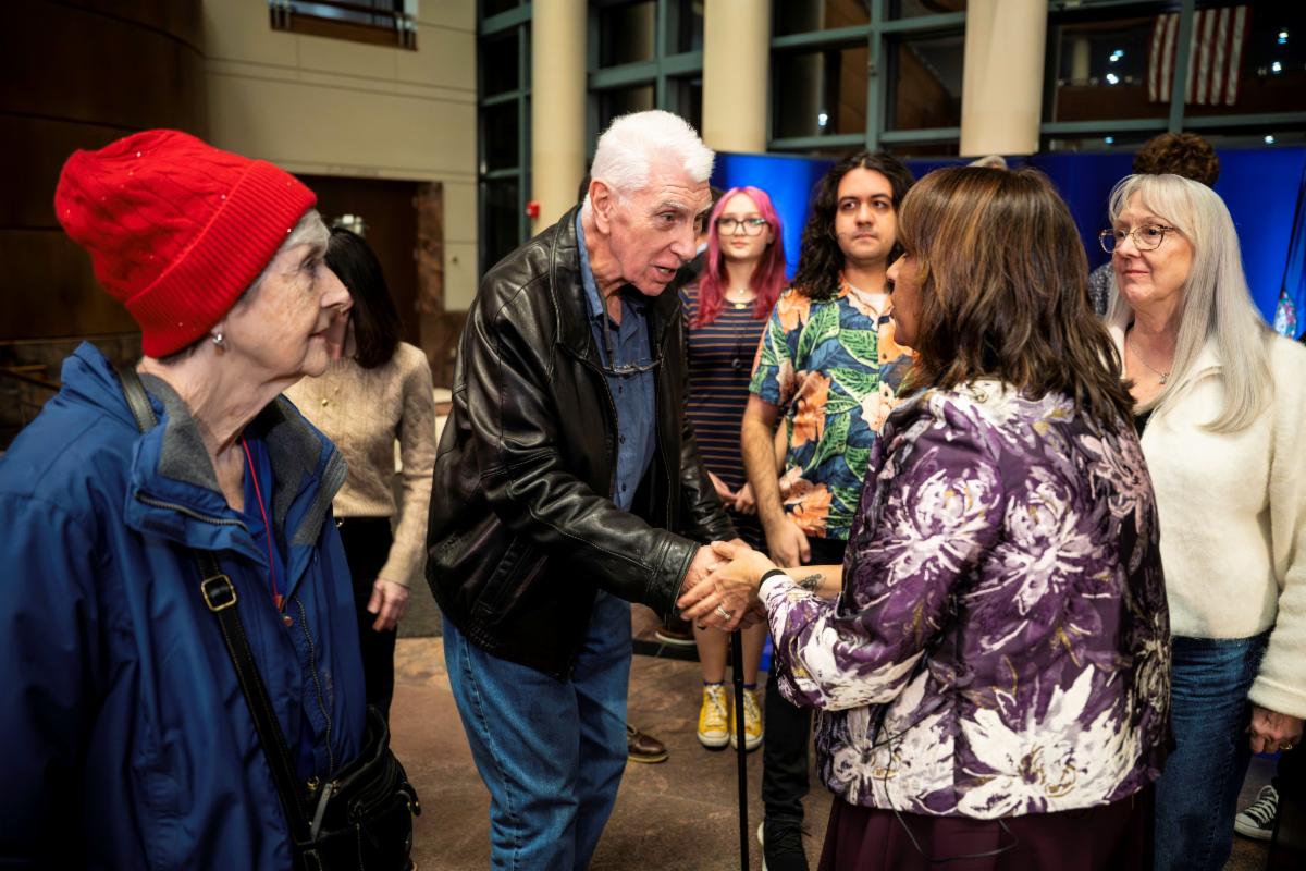 Supervisor Sizemore Heizer greets friends and family after her swearing-in ceremony.