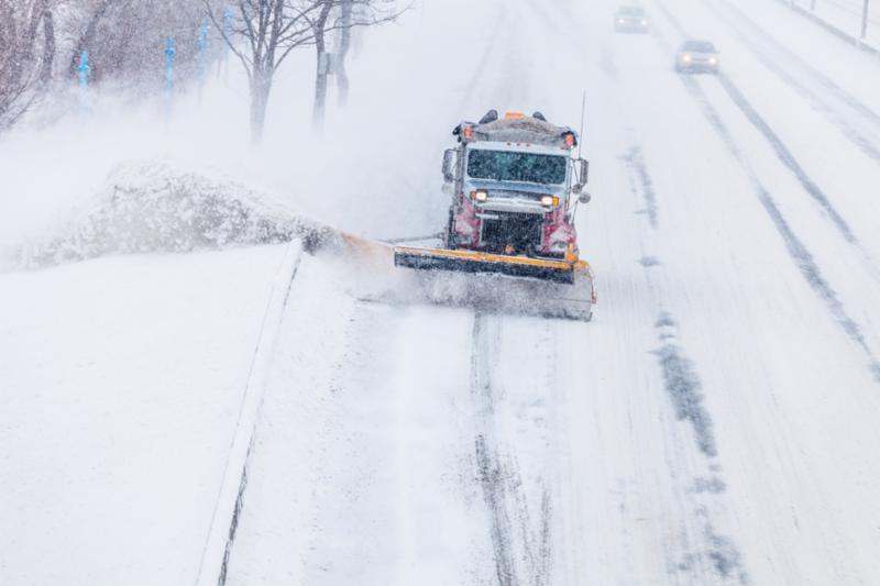 Photo of a snow plow doing its thing