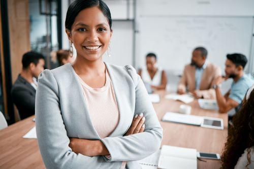 person smiling as part of community board