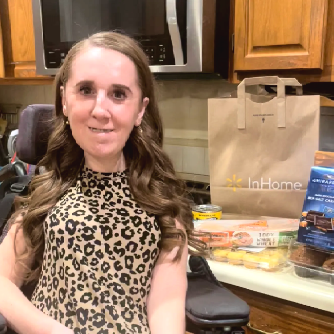 Heather Tamko in wheelchair in kitchen