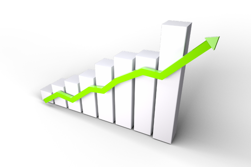 3D bar graph with a green arrow on top indicating growth.