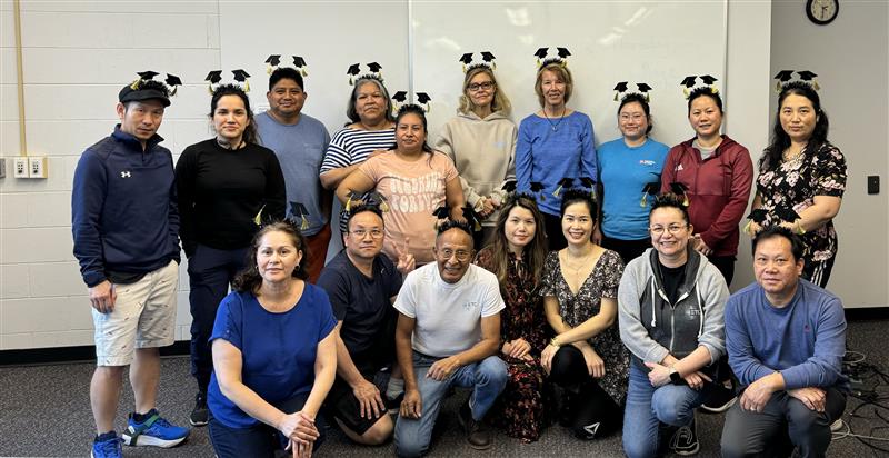 Students wearing graduation headbands