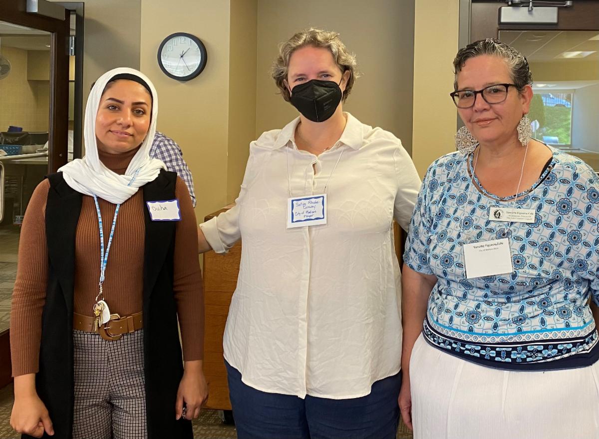 Three participants at Town Hall meeting