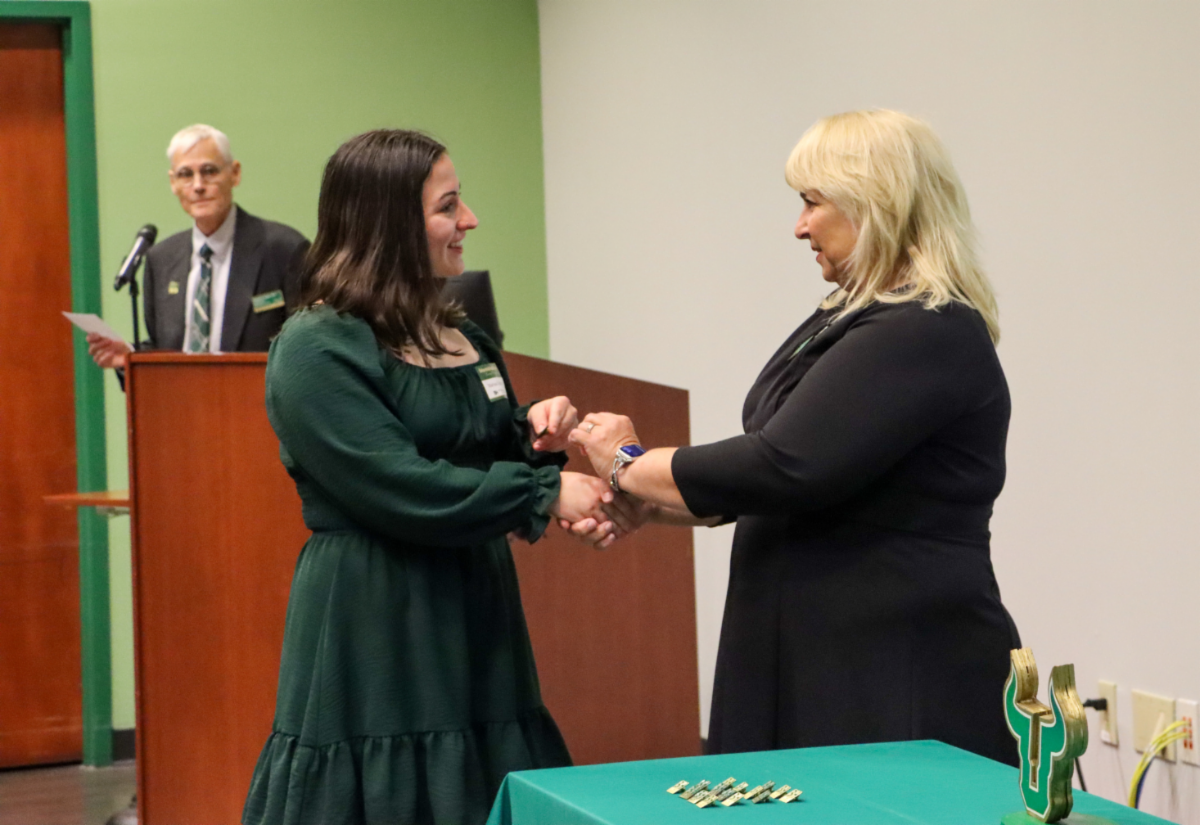 CBCS student receives their pin at a pinning ceremony 