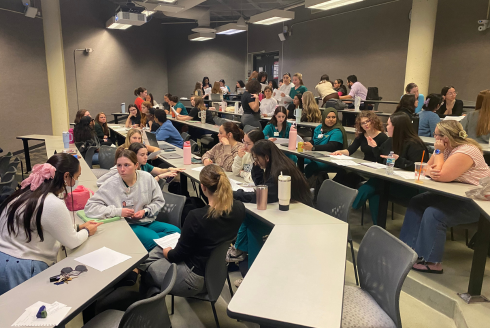 A classroom filled with students 