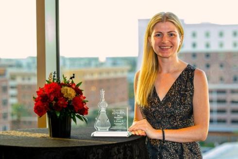 Nik Lampe receives their award