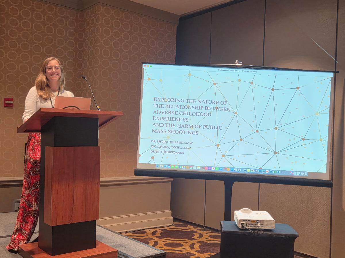 Britani Holland presenting at a conference 