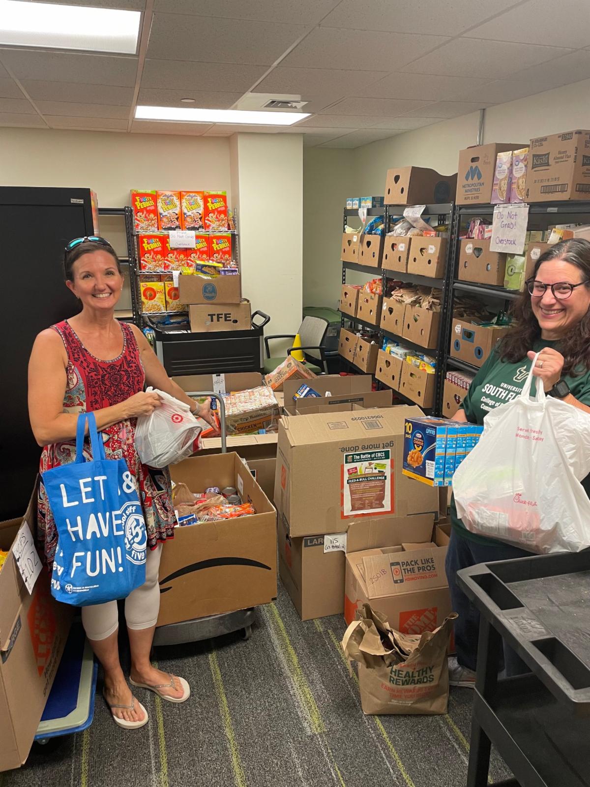 Food Drive Donation Lisa and Wendy.jpg