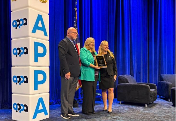 Cassia Kranz receiving her award at the American Probation and Parole Association conference