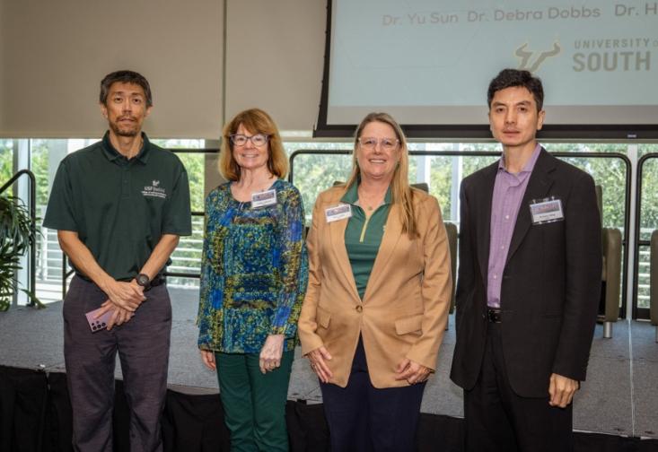 Yu Sun Lindsay Peterson Debra Dobbs and Dr. Hongdao Meng