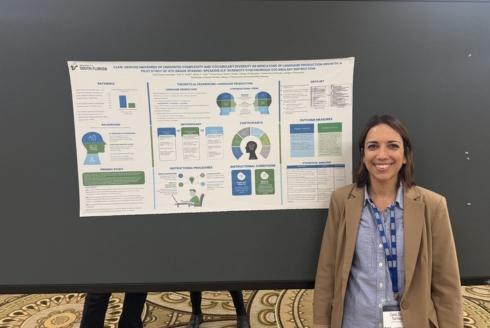 Carla Zayas-Santiago with her poster presentation