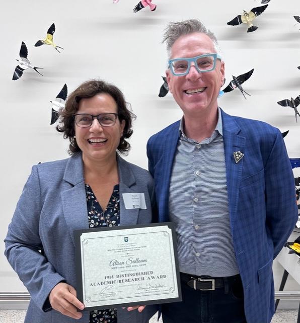 Salloum accepts Tulane award_2023