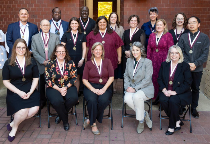 A group photo of Richard Dembo with other research fellows