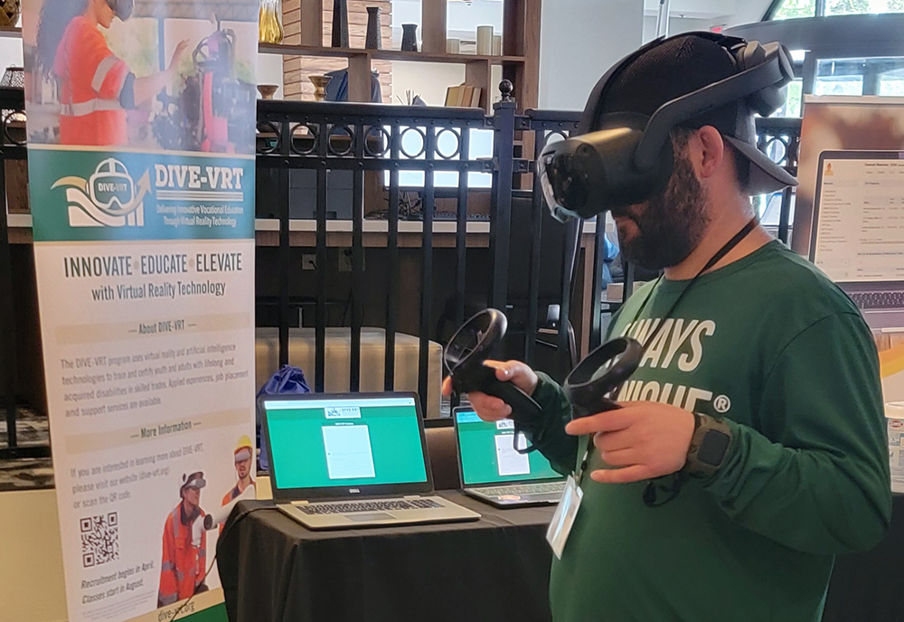 Conference attendee tests VR system