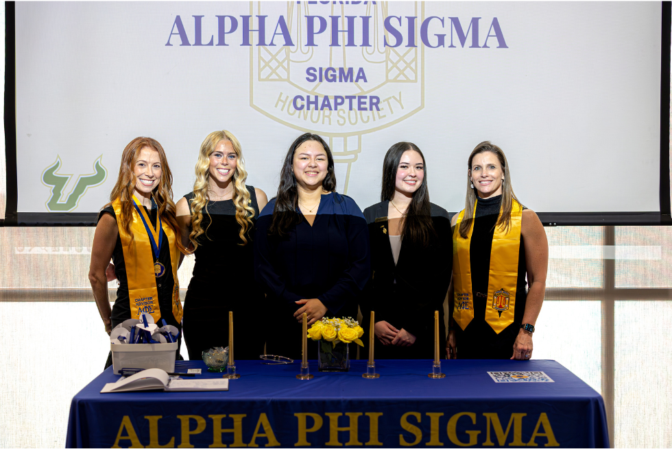 Group of students at the Alpha Phi Sigma induction ceremony