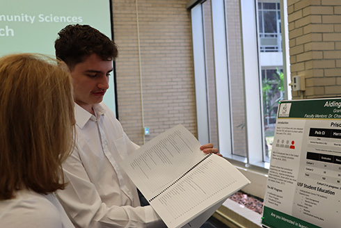 Undergraduate student presents research