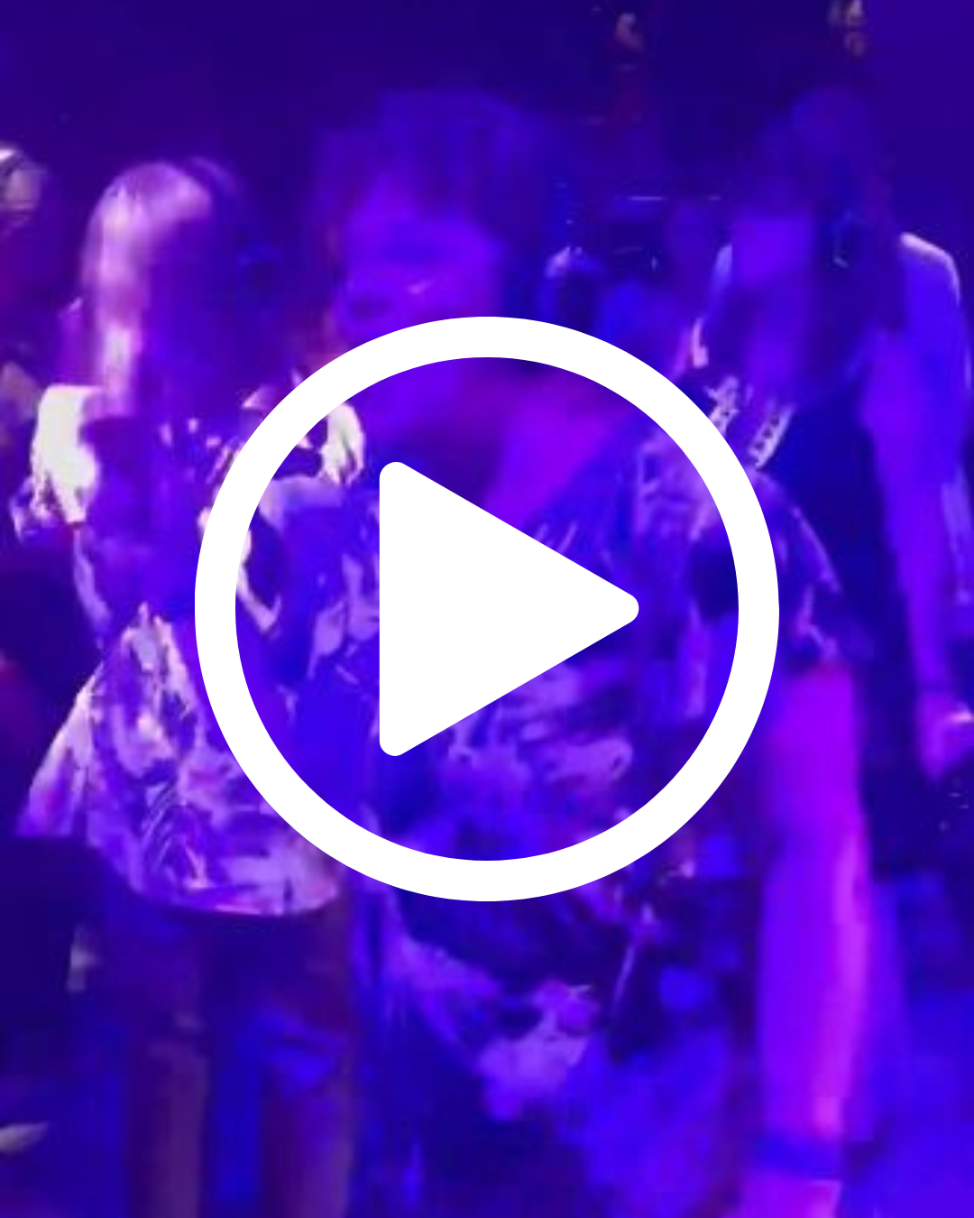 Graphic of a play button over top of a photo of woman on busy dancefloor 