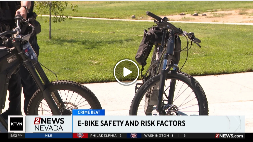 A screenshot from a KTVN broadcast about e bikes. An e bike is on screen with text that says e bike safety and risk factors.