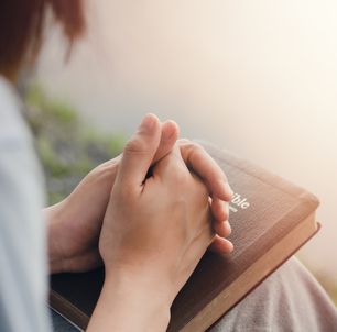 girl s hand sitting praying for god s blessing Along with coming to heal a peaceful life with nature. and the Holy Word