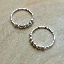 Rolling ball silver rings 
