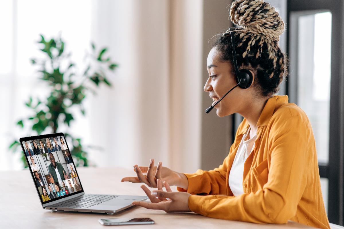 Woman participating in virtual meeting
