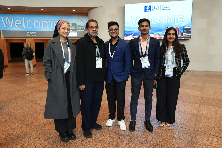 ICANN84 participants -- including Tarek Kamel Award recipient Alfredo Calderón -- gather for a group photo.