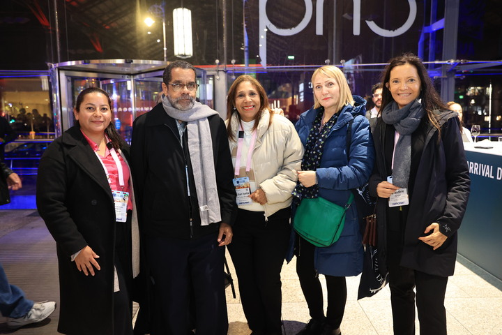 ICANN84 participants -- including Tarek Kamel Award recipient Alfredo Calderón -- gather for a group photo.