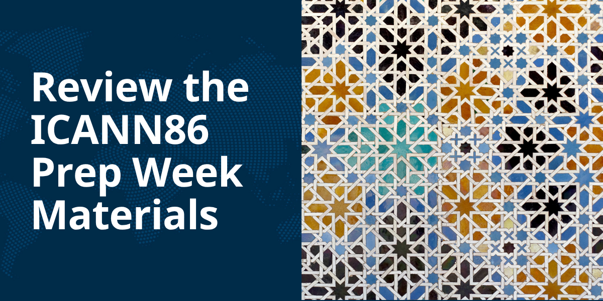A tile mosaic of black, orange, turquoise, and light blue in geometric patterns.