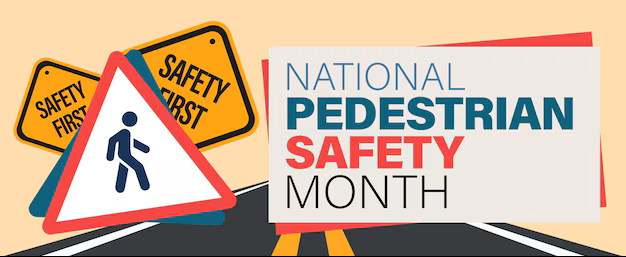 A graphic with the words 'National Pedestrian Safety Month' on it. 