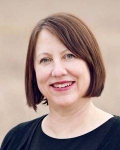 A professional headshot of Commissioner Kristin Stephens. 