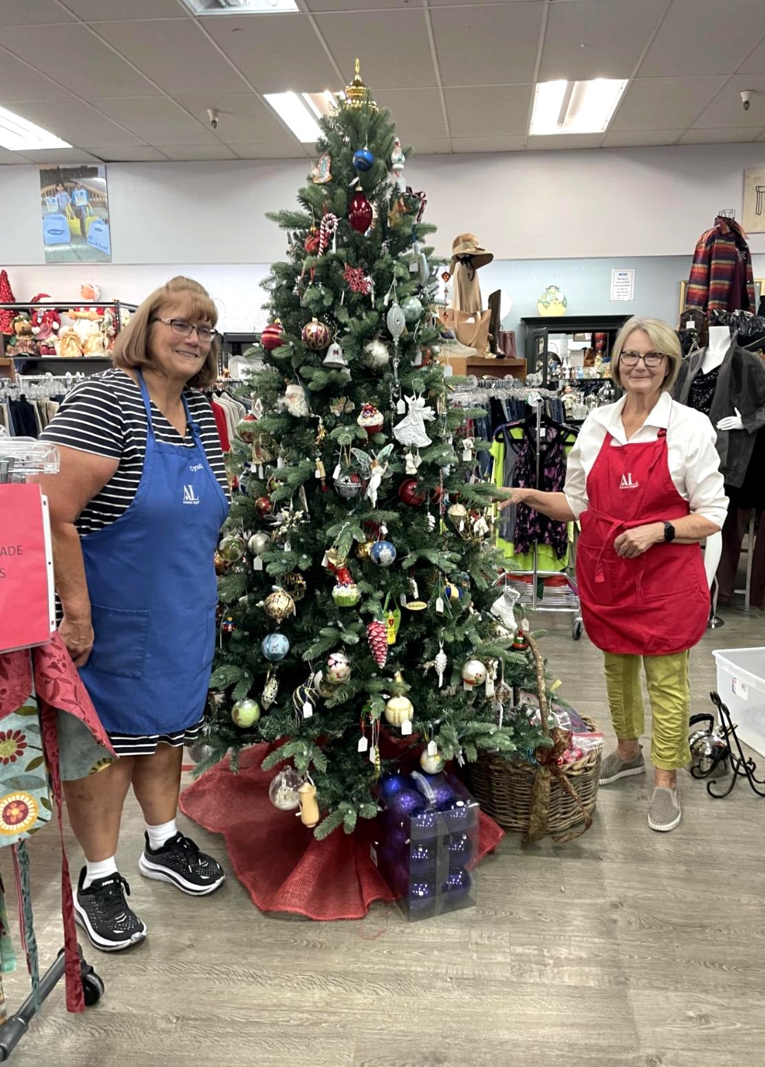 Volunteer Members with decorated tree 