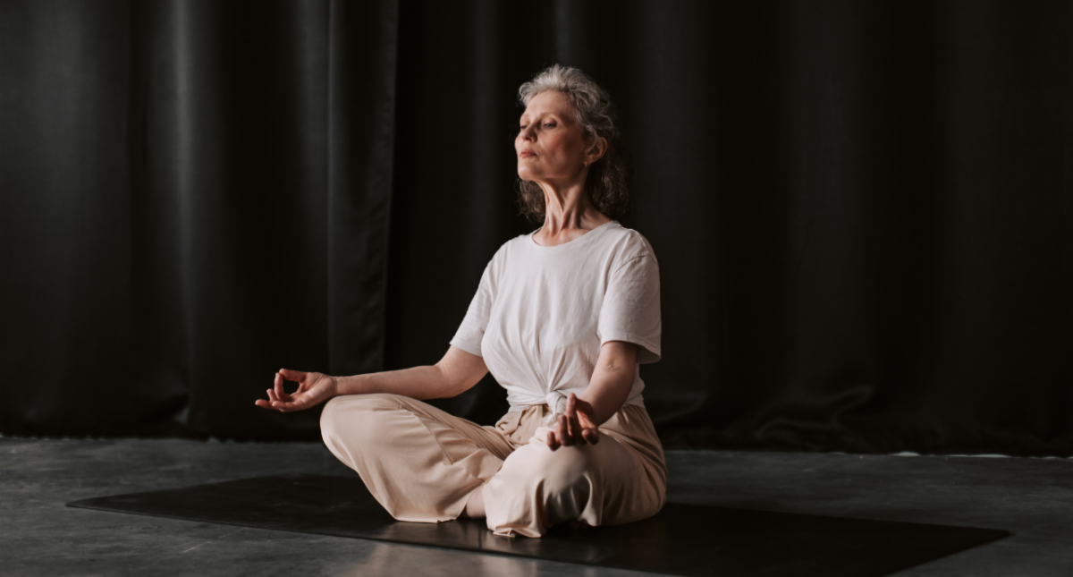 older woman meditating