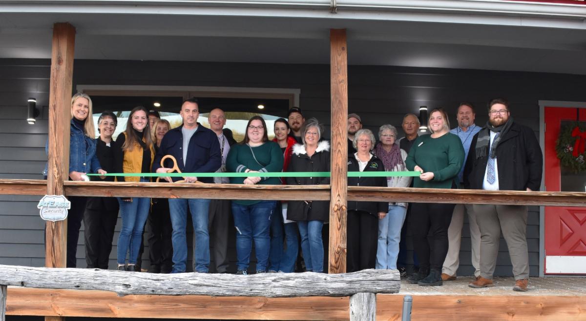 Photo: Owners, Joe and Stephanie Kehoe, are pictured with Riverside Grille staff and Garrett County Government and Chamber of Commerce staff
