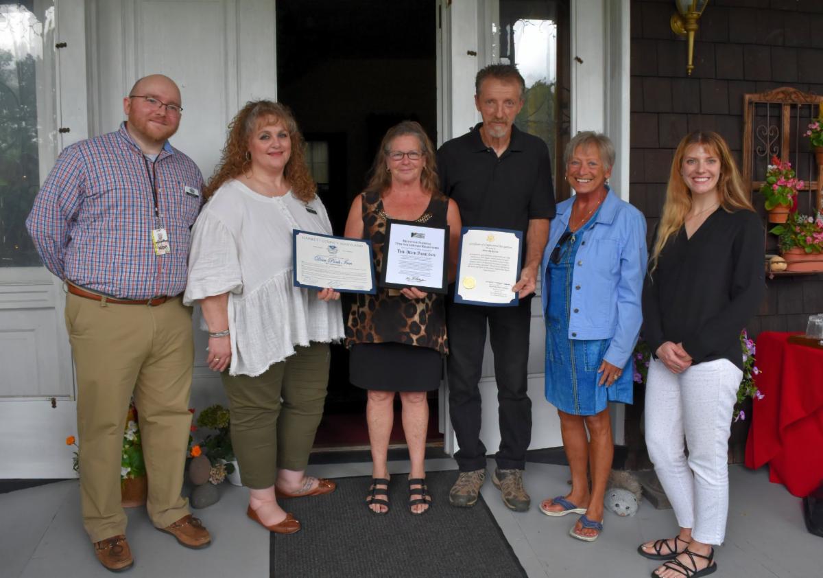 Photo: 30th Anniversary commendations presented to the owners of the Deer Park Inn