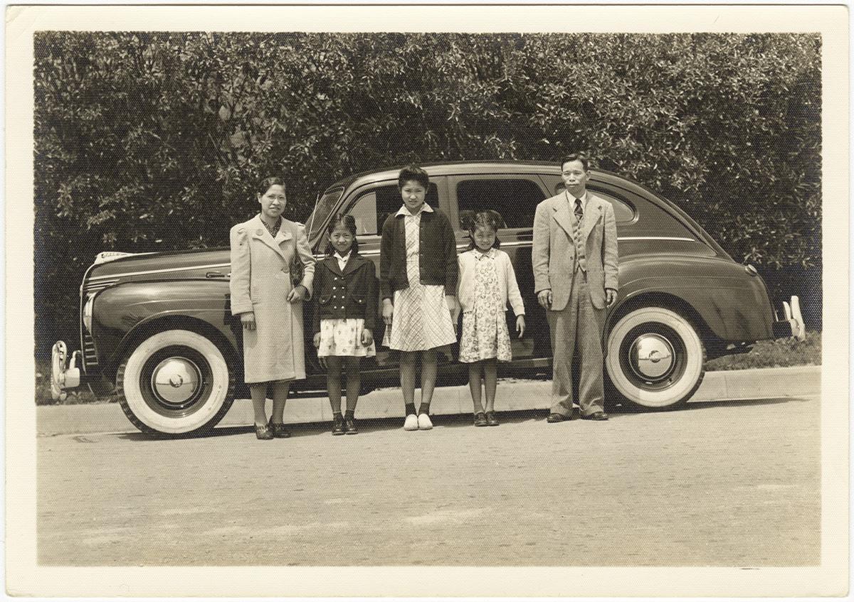 Yamashita Collection - Tsugio Angela and Lillian along with friends pose in front of the family car - Japanese American National Museum 96.68.9